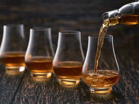 whisky drinks being poured